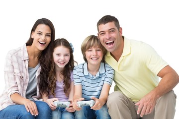 Happy family playing video game together