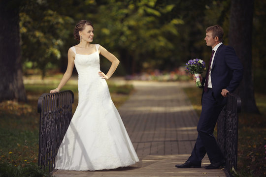 bride and groom in autumn park Love Life