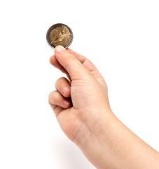 Fototapeta na wymiar Two euro coin in child hand