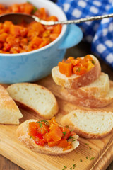 Pumpkin caviar on a slice of baguette