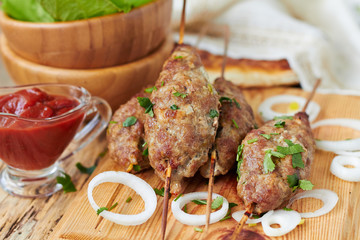 Minced meat kebab on skewers