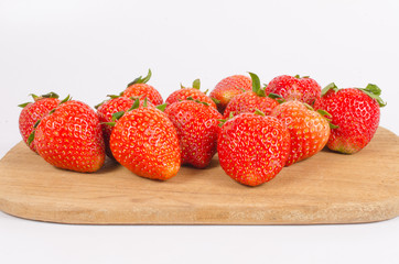 strawberries on wooden board