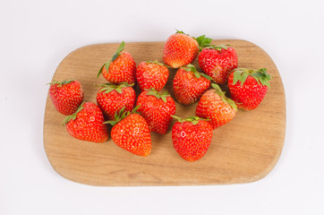 strawberries on wooden board