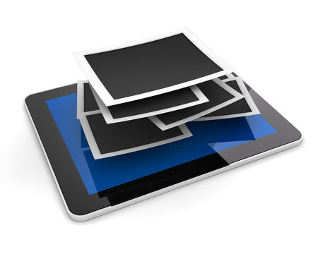 Stack of blank picture frames on a tablet