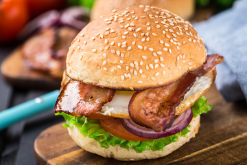 Home made burger on wooden board