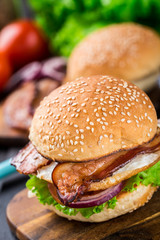 Home made burger on wooden board