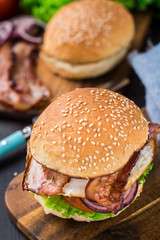 Home made burger on wooden board