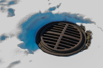 Manhole in winter