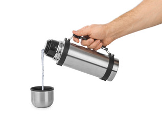 Hand and thermos flask