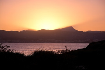 Beautiful sunset with sun effects, Mallorca, Spain.