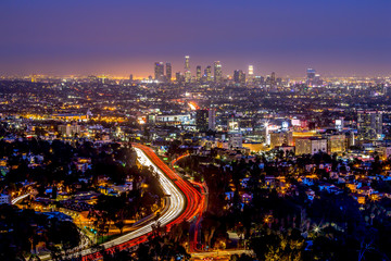 Naklejka premium Los Angeles downtown and hollywood skyline at night