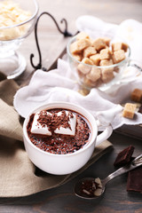 Hot chocolate with marshmallows in mug,