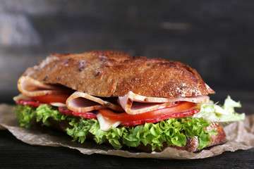 Fresh and tasty sandwich with ham and vegetables
