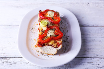 Tasty sandwich with vegetables and cheese