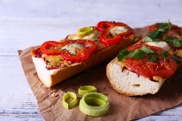 Tasty sandwich with vegetables and cheese