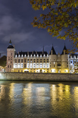 Fototapeta na wymiar Night view of Castle Conciergerie in Paris,France