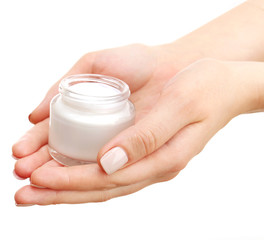 Female hand with cream isolated on white