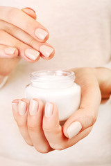 Female hand with cream, closeup
