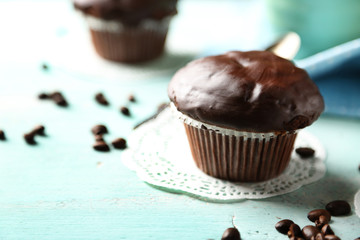 Tasty homemade chocolate muffins and cup of coffee