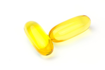 vitamin e fish oil capsule isolated on white background