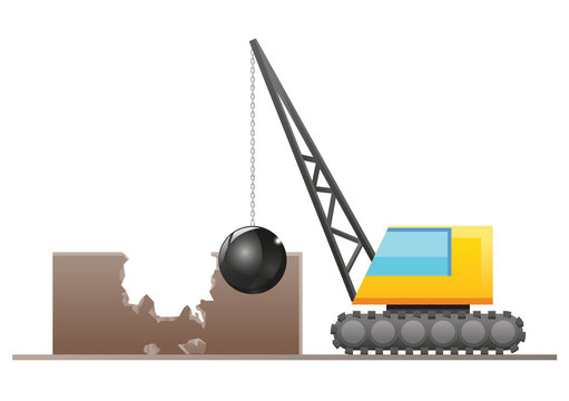 Crane with wrecking ball demolishing a building