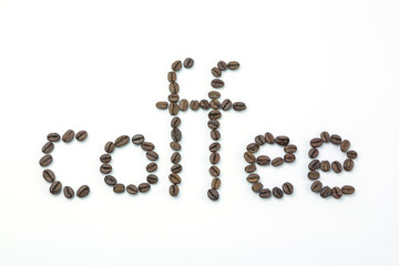 Text coffee by coffee beans