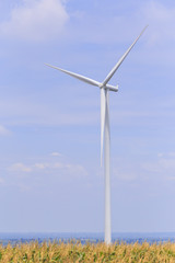 Wind Turbine for alternative energy on background blue  sky .