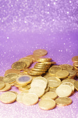 Euro coin stack over abstract background