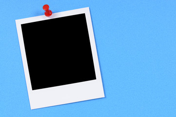 One single polaroid style blank photo frame print with blue background