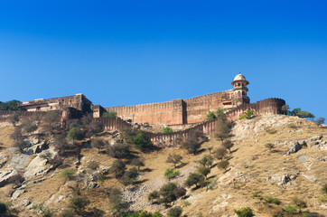 Fototapeta na wymiar Ancient walls of Amber Fort with landscape in Jaipur