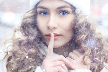 Winter portrait of woman snow