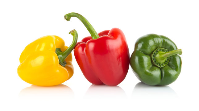 Studio shot of red,yellow,green bell peppers isolated on white