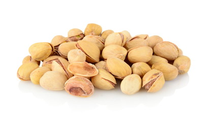 Studio shot of group of pistachios isolated on white background