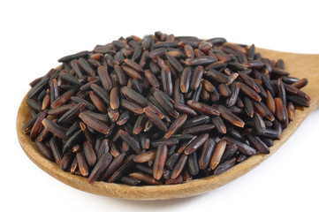 rice berry in wooden spoon