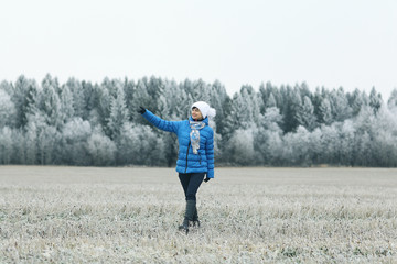 girl in a field of winter frost