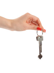 Hand with key on white background