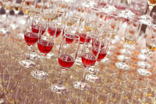Wedding glasses filled with wine and champagne