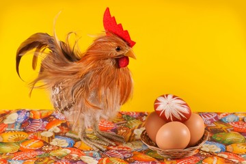 Easter, chicken, egg, on a yellow background