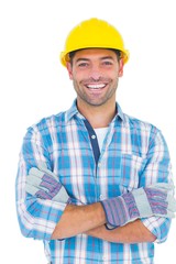 Portrait of smiling manual worker with arms crossed