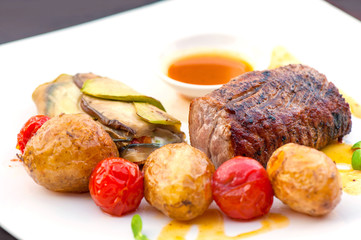 Prime grilled juicy beef steak with roasted vegetables