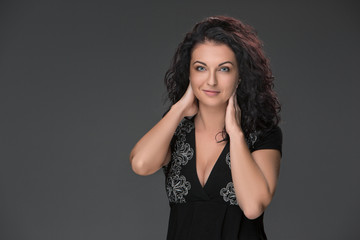 Portrait of beautiful dark-haired young woman