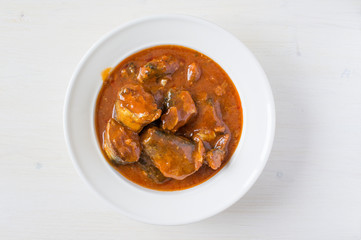 Canned fish in tomato sauce