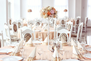 restaurant table with wedding ornaments on