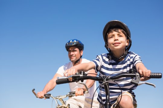 Father and son on a bike ride © WavebreakMediaMicro