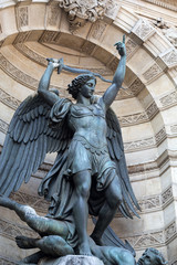 Fototapeta premium statues of Fountain Saint Michel in Paris
