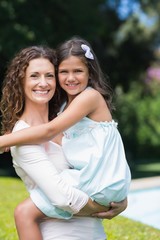 Fototapeta premium Happy mother and daughter hugging