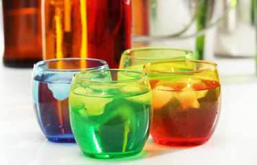 Glassware of different drinks, closeup