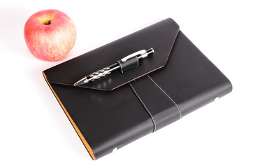 black luxury organizer with apple