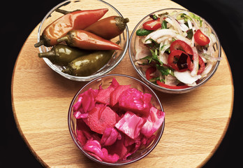 Assortment of vegetarian dishes on a black background