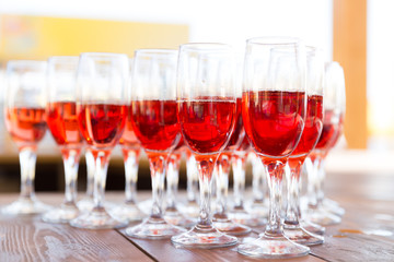 Party row of champagne glasses on a table